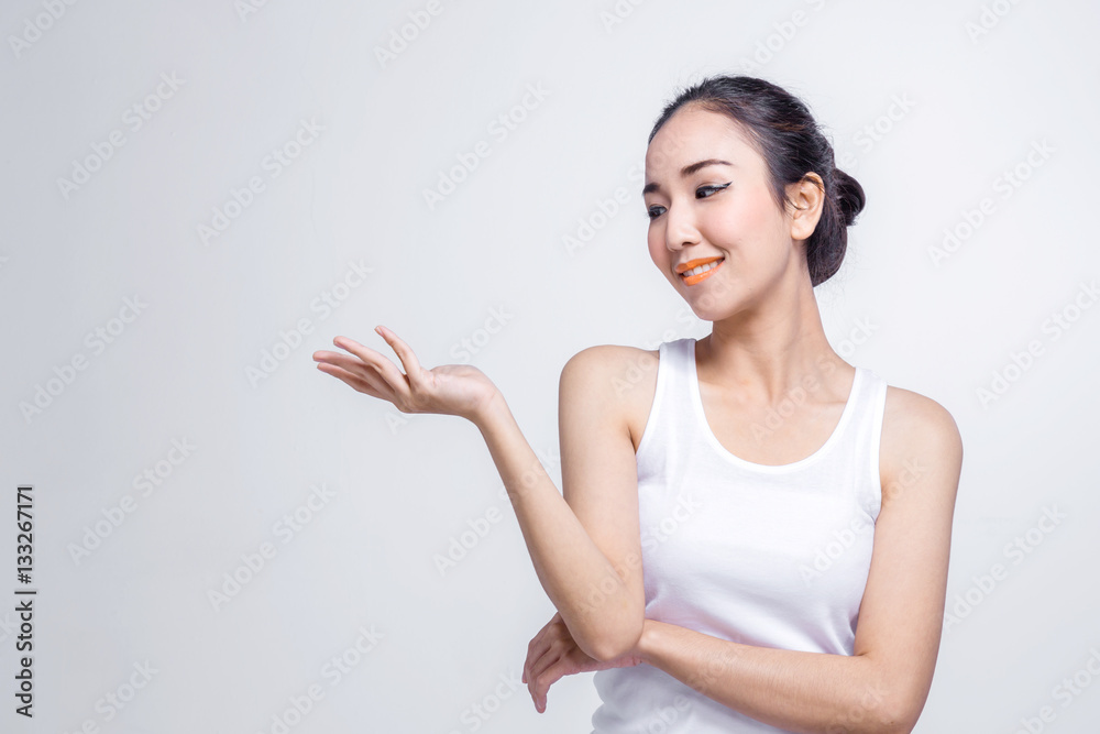Beauty Woman face Portrait, girl points by hand, girl showing pr Beauty Woman face Portrait, girl points by hand, girl showing pr