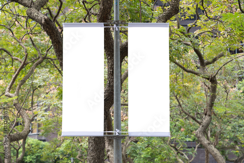  Large blank billboard on a street wall,  banners with room to add your own text
