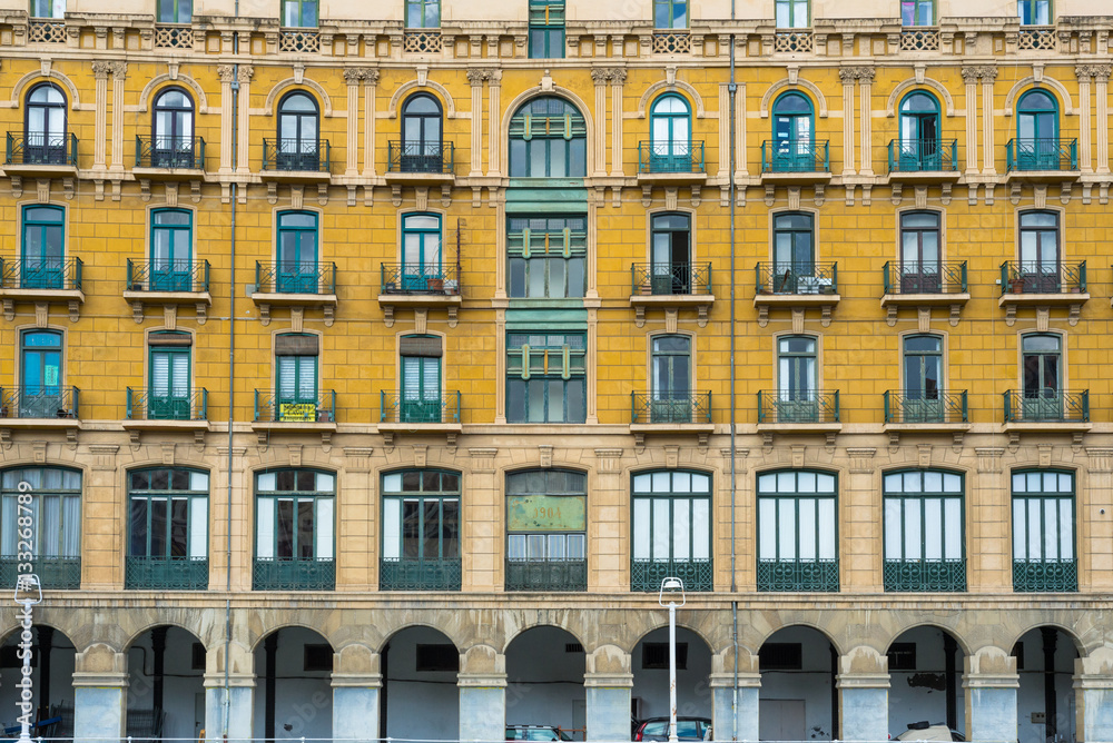 House facades in Bilbao along the Nervion river that runs through the city into the Cantabrian Sea. The apartment blocks are situated in the districts San Frantzisko and Bilbao la Vieja