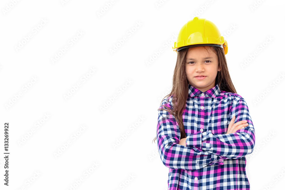 Little girl with a yellow helmet standing with arms crossed ,Chi Little girl with a yellow helmet standing with arms crossed ,Chi
