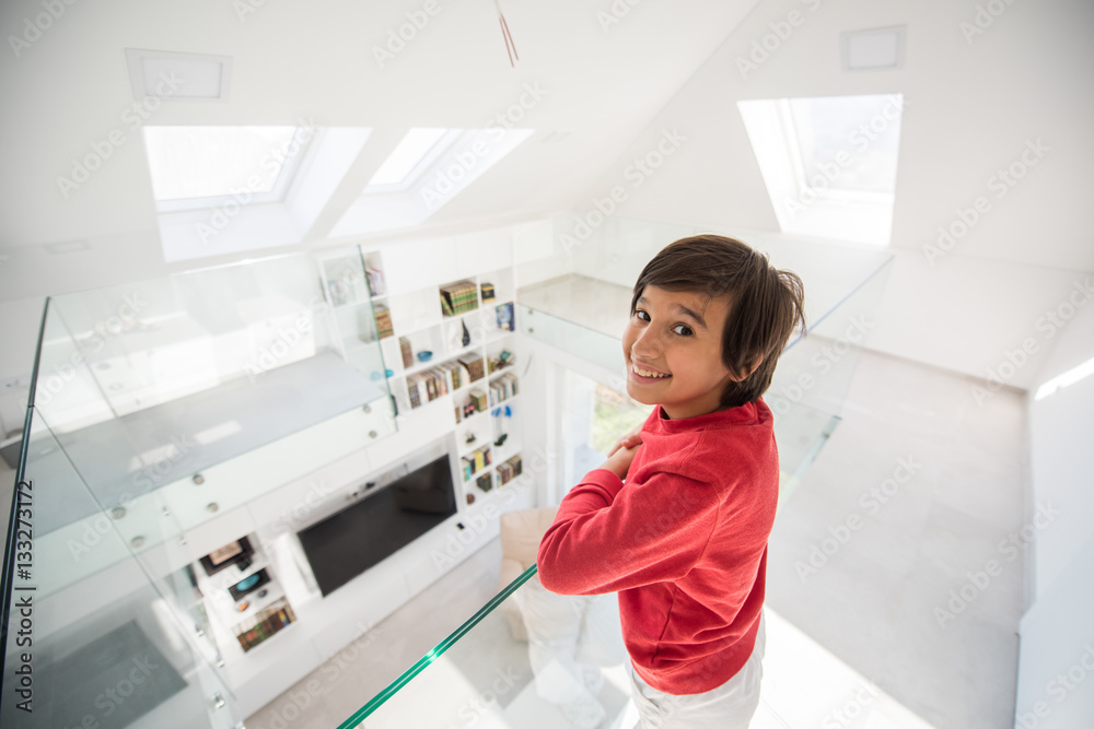 Child inside interior of modern home Child inside interior of modern home