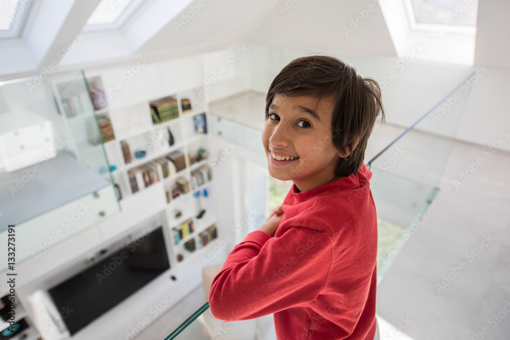 Child inside interior of modern home Child inside interior of modern home