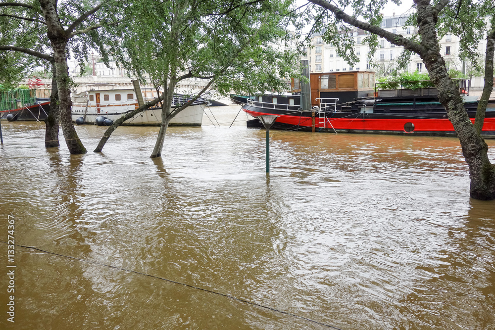 PARIS, FRANCE - June 4, 2016 : The worst floods in a century hav PARIS, FRANCE - June 4, 2016 : The worst floods in a century hav