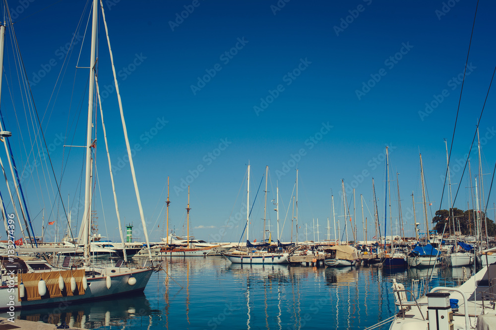 pier with yachts at sea