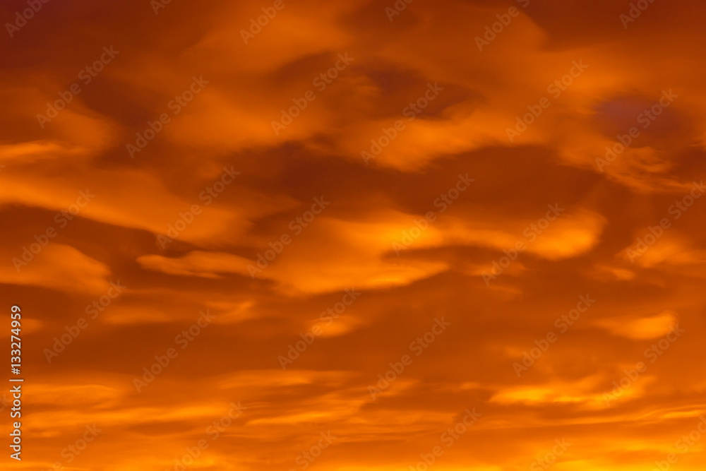 Colorful clouds of various shades on sunrise sky