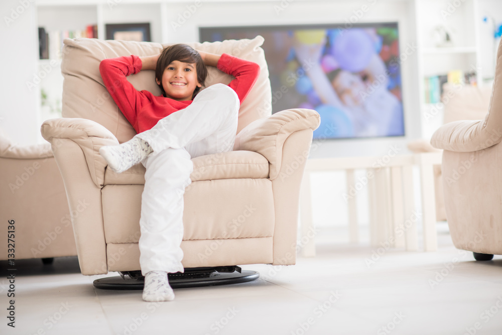 Kid relaxed on sofa