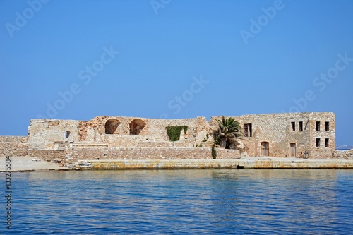 Fotografie View of the Venetian San Nicolo Bastion along the harbour wall, Chania, Crete