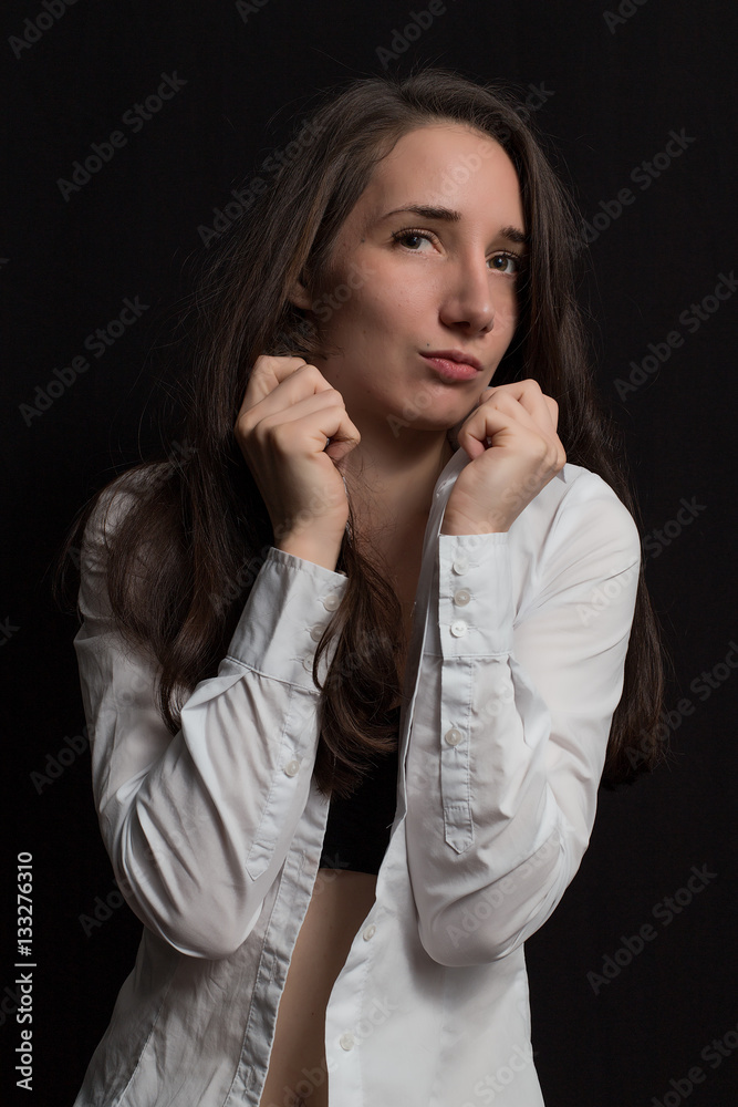 Pretty young girl show emotions isolated on black Pretty young girl show emotions isolated on black