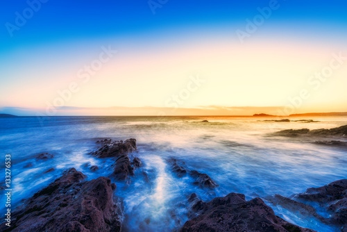 sunrise on the coast of Ireland  Portmarnock. Toned image