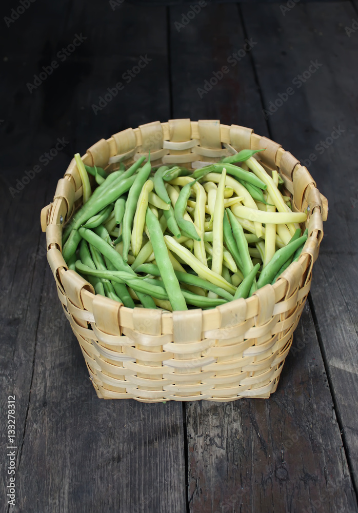 Green beans on a wooden table
