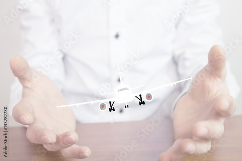 airplane on businessman hands