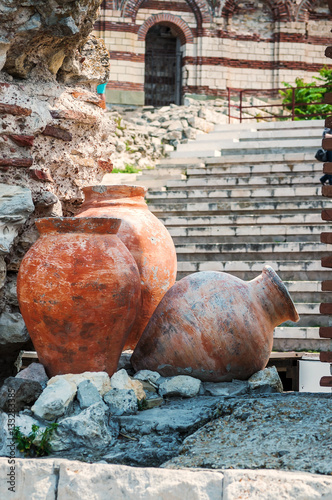 Ancient amphoras near Ruined Church of Christ Pantocrator in Nesebar. Bulgaria