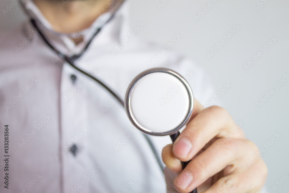 businessman with stethoscope businessman with stethoscope