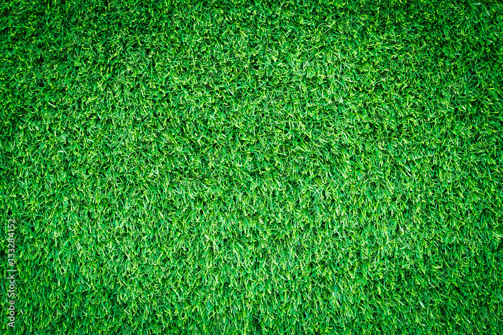 Fototapeta premium Artificial green grass texture, green grass background for golf course, soccer field or sports background concept design.