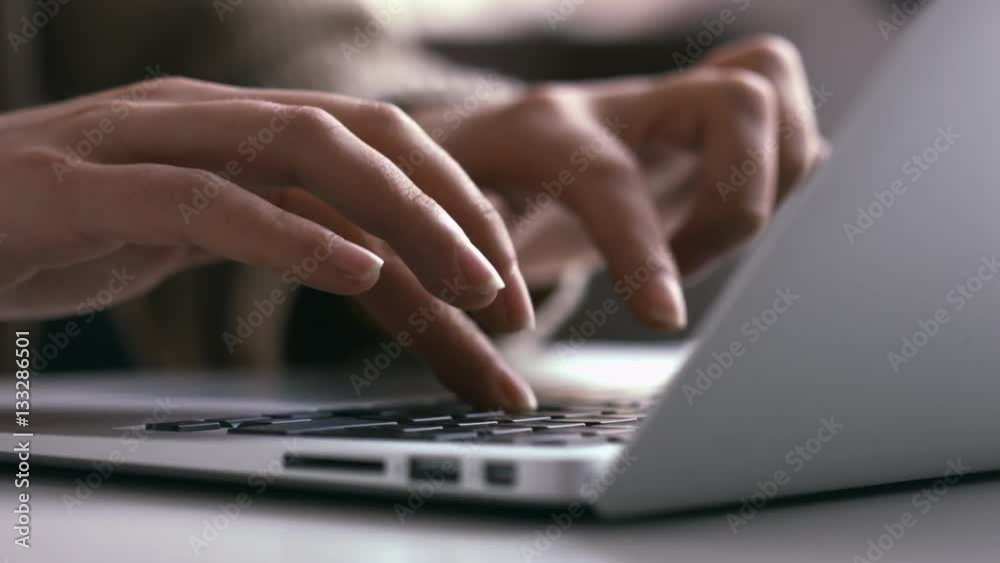Hands on keyboard close up view Hands on keyboard close up view