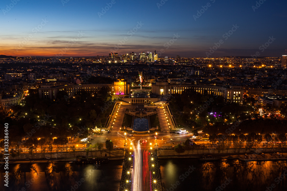 View from Paris Eifel Tower towards La Defense at night with a long exposure