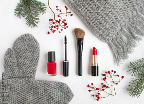 Winter accessories collage with cosmetics and clothes on white background. Flat lay, top view