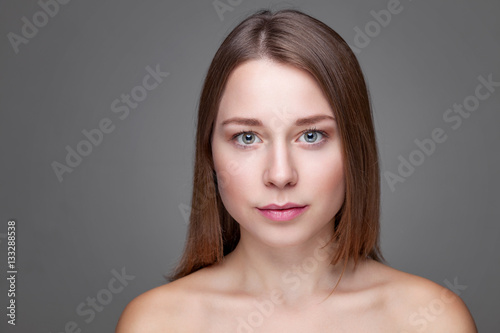 Young natural woman with great skin complexion