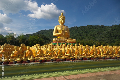 Buddha image of Lord buddha among the 1 250 monks  the symbol of Magha Puja day  Buddha Memorial park  Nakorn nayok  Thailand