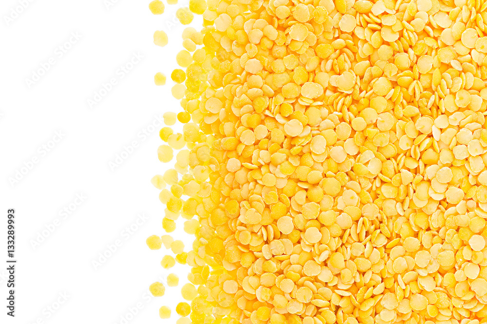 Border of yellow purified lentil closeup with copy space on white background. Isolated. Healthy protein food. Border of yellow purified lentil closeup with copy space on white background. Isolated. Healthy protein food.