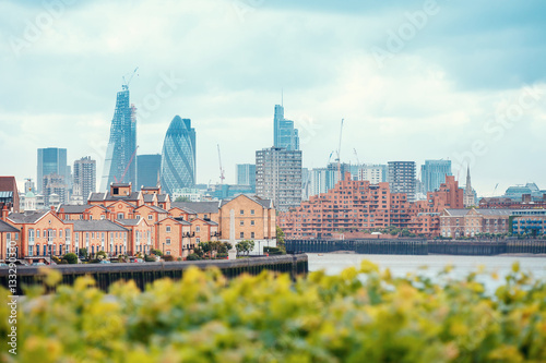 View of London Docklands with the Thames River, downtown, cucumber and city center photo