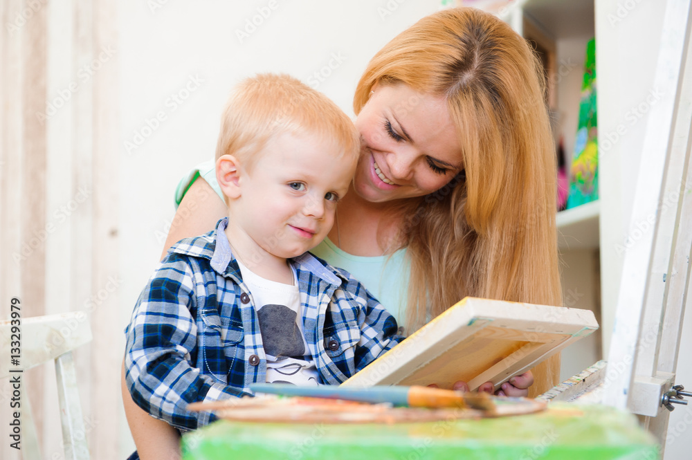 Mother and child draw a picture paints, art lesson Mother and child draw a picture paints, art lesson