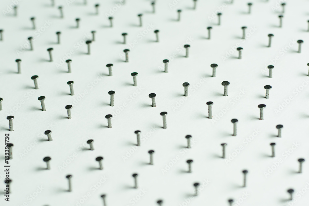 Obraz premium Group of Concrete nails Galvanized dip color on white paper back