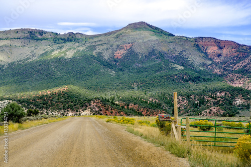 gravel road among colorful hills - Colorado headwaters scenic byway Trough road, Bond, Grand County, Colorado, USA