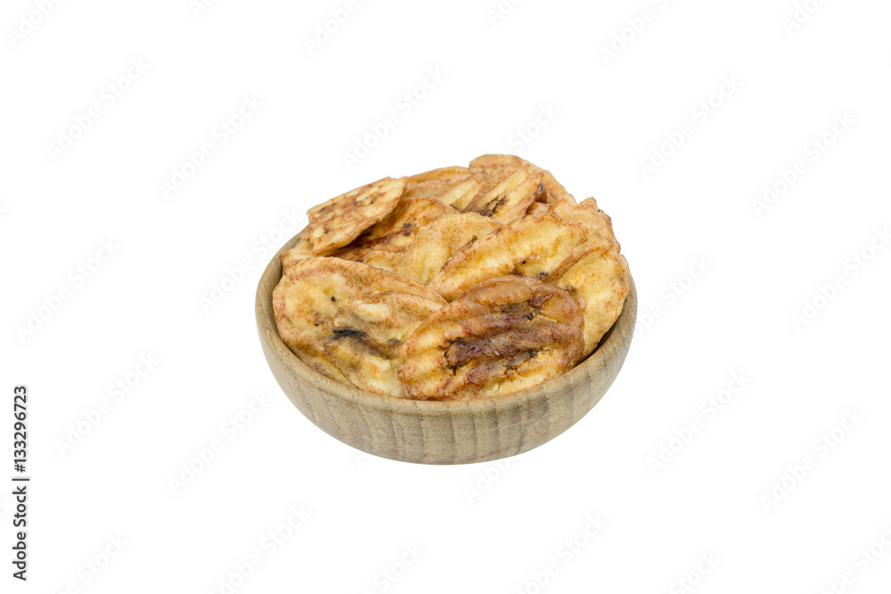 Dried banana slices in bowl wood isolated on white background Dried banana slices in bowl wood isolated on white background