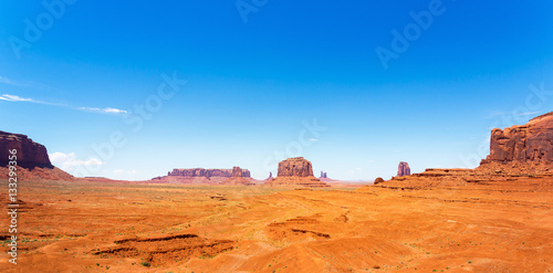 Sandstone mountains in desert of Monument Valley