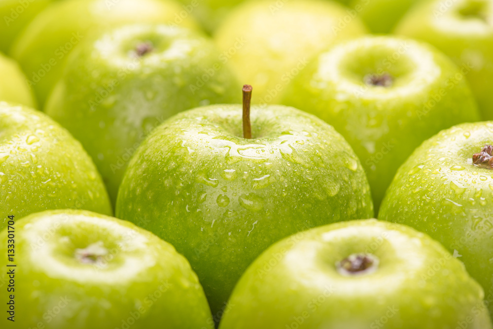 Green fresh apples close up, selective focus. Green fresh apples close up, selective focus.