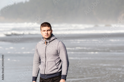 Lone man at USA Pacific coast beach