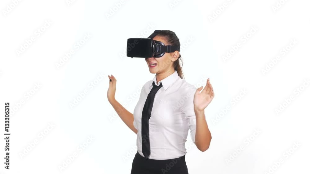Woman wearing virtual reality glasses and making gestures Woman wearing virtual reality glasses and making gestures