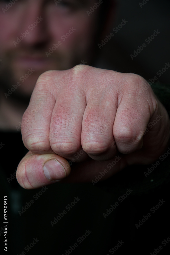 An angry man with fist