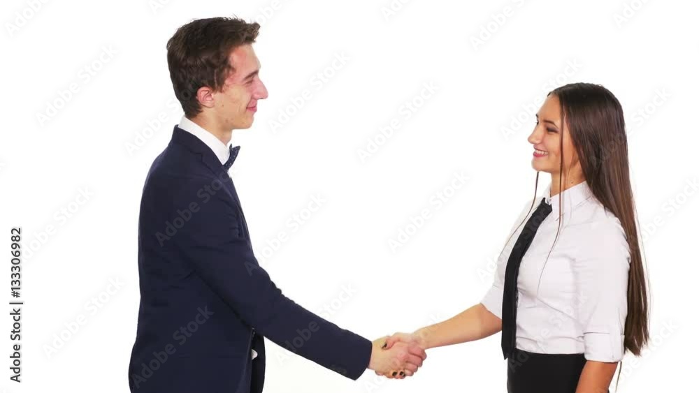 Colleagues shaking hands and grasping hands happily Colleagues shaking hands and grasping hands happily