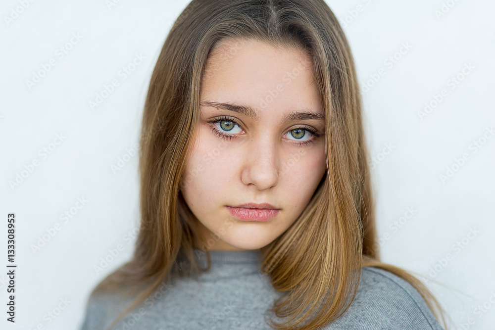 Teenager girl posing on white background isolated Teenager girl posing on white background isolated