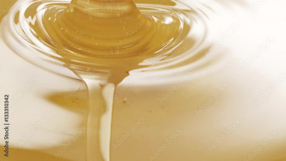 honey poured in bowl in slow motion, 180fps prores footage honey poured in bowl in slow motion, 180fps prores footage
