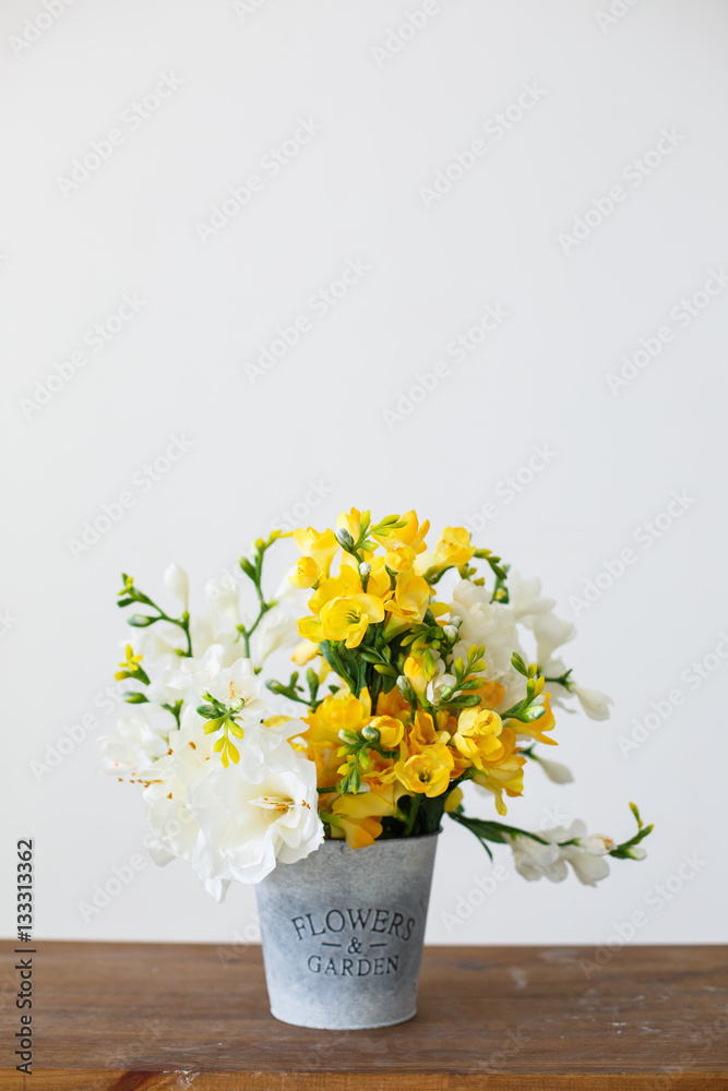 garden basket with yellow flowers