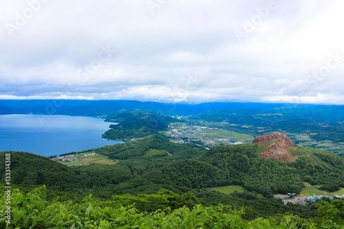 Showa-shinzan mountain is a volcanic lava dome in the Shikotsu-Toya National Park, Hokkaido, Japan, next to Mount Usu. It also has ropeway up to Mount Usu. © 新太郎 亀井