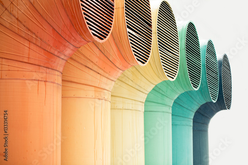 large color ventilation pipes of industrial building, isolated on white