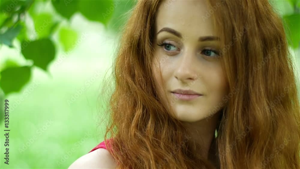 Portrait, beautiful, attractive girl with a sweet smile, curly hair, blue eyes Portrait, beautiful, attractive girl with a sweet smile, curly hair, blue eyes