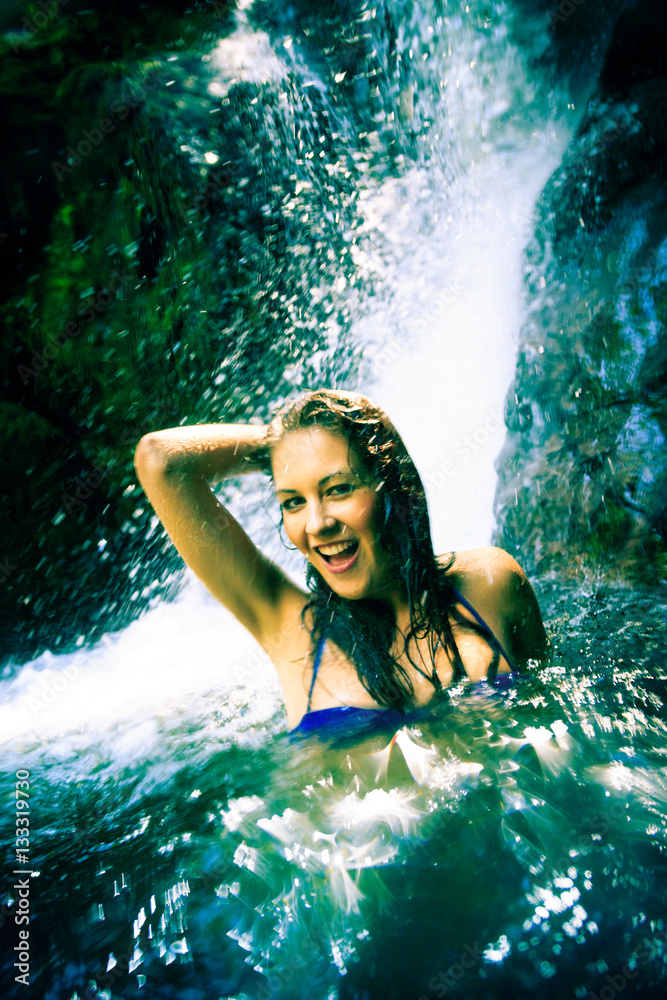 Fototapeta premium Beautiful Lady By The Waterfall