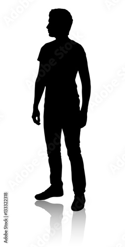 Silhouette of a man who stands sideways