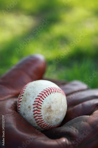 Vintage baseball glove and ball