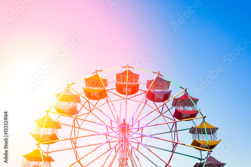 Ferris wheel Player of the fun kids with blue sky,Old and vintage Ferris wheel