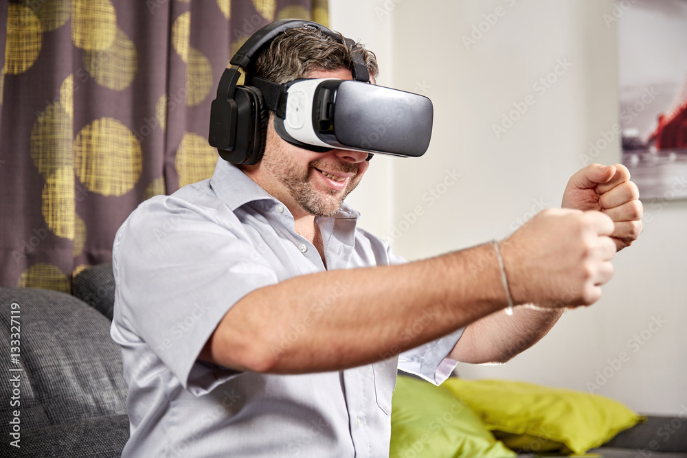 Man with vr virtual reality headset grabbing with hands Man with vr virtual reality headset grabbing with hands