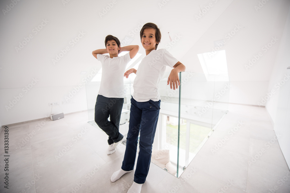 Cute boy in new modern property home interior