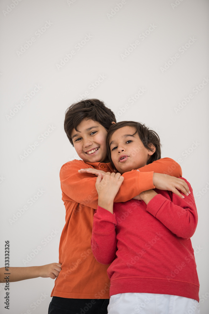 Cute school kid posing in studio with different facial expressio Cute school kid posing in studio with different facial expressio