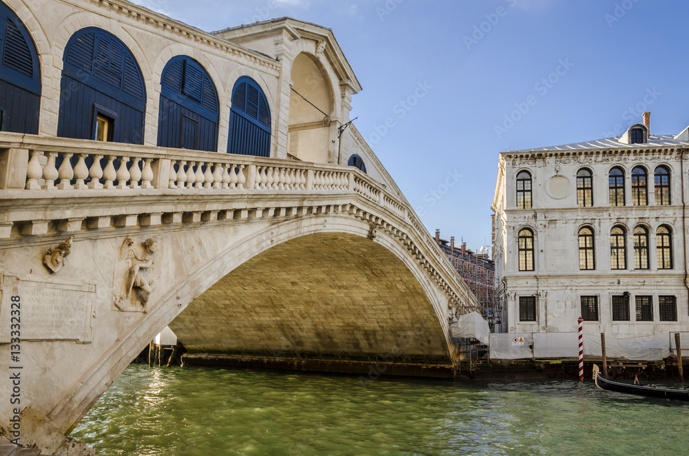 the rialto bridge in venice during a sunny day, Venice, Italy