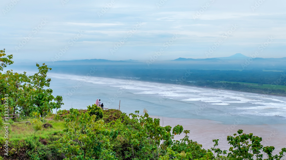 Beautiful view of sea, beach and coast from top of the hill, The name of the beach is Logending, located in Kebumen, Indonesia